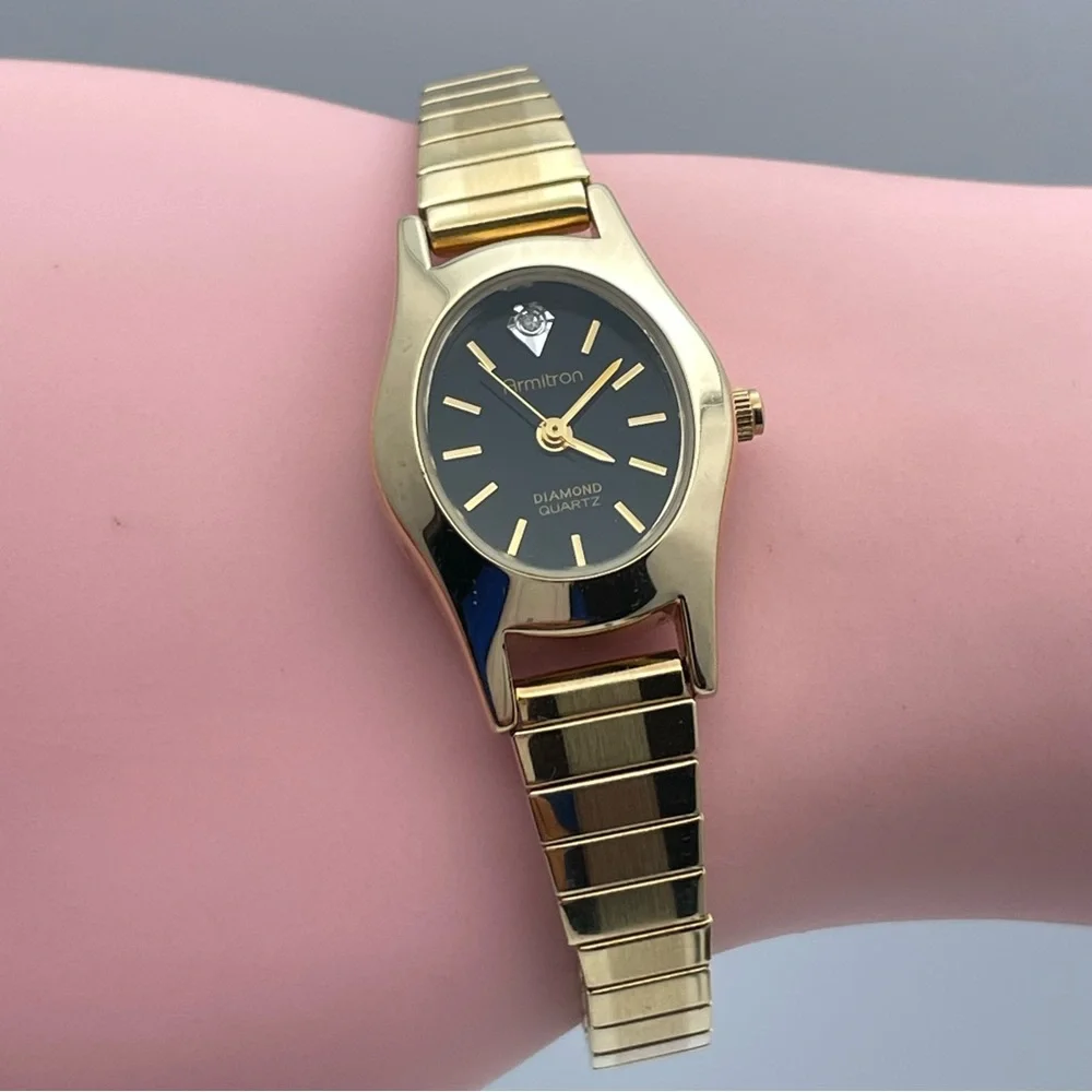 Armitron Diamond Quartz Gold Tone Stretch Watch Black Dial New Battery